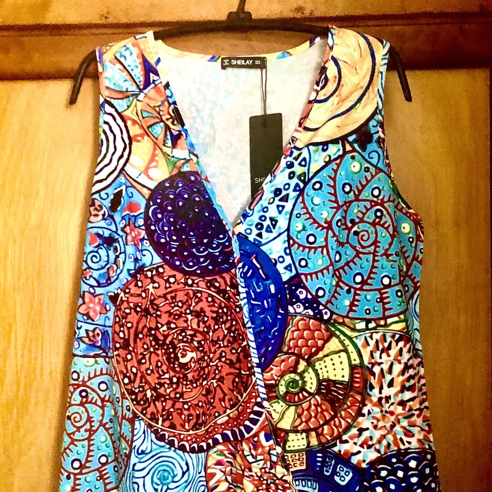 Sleeveless colorful tank top. Never worn. B